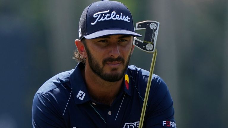Max Homa lines up a putt on the seventh hole during the first round of The Players Championship golf tournament Thursday, March 14, 2024, in Ponte Vedra Beach, Fla. (AP Photo/Lynne Sladky)