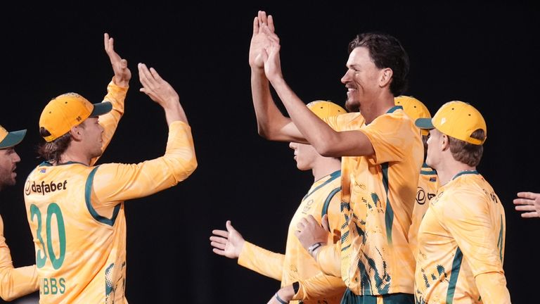 South Africa's Marco Jansen (centre) celebrates taking the wicket of England's Jacob Bethell during the first International T20