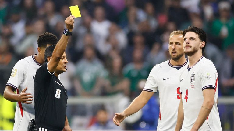 Declan Rice receives an early yellow card against Mexico